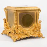 A fine ormolu bronze pedestal, decorated with putti and flowers