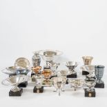 A large colllection of 18 silver and silver plated trophies.
