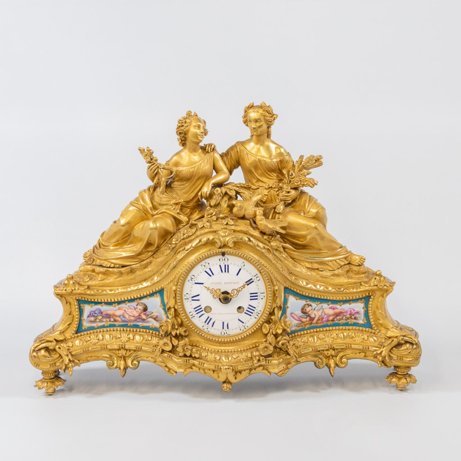 Ormolu Bronze Mantle clock, with elegant ladies and pigeons and Sèvres plaquettes. André Hoffmann.