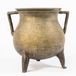 A bronze kettle.