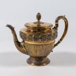 A silver tea pot, made in Germany and marked 800.