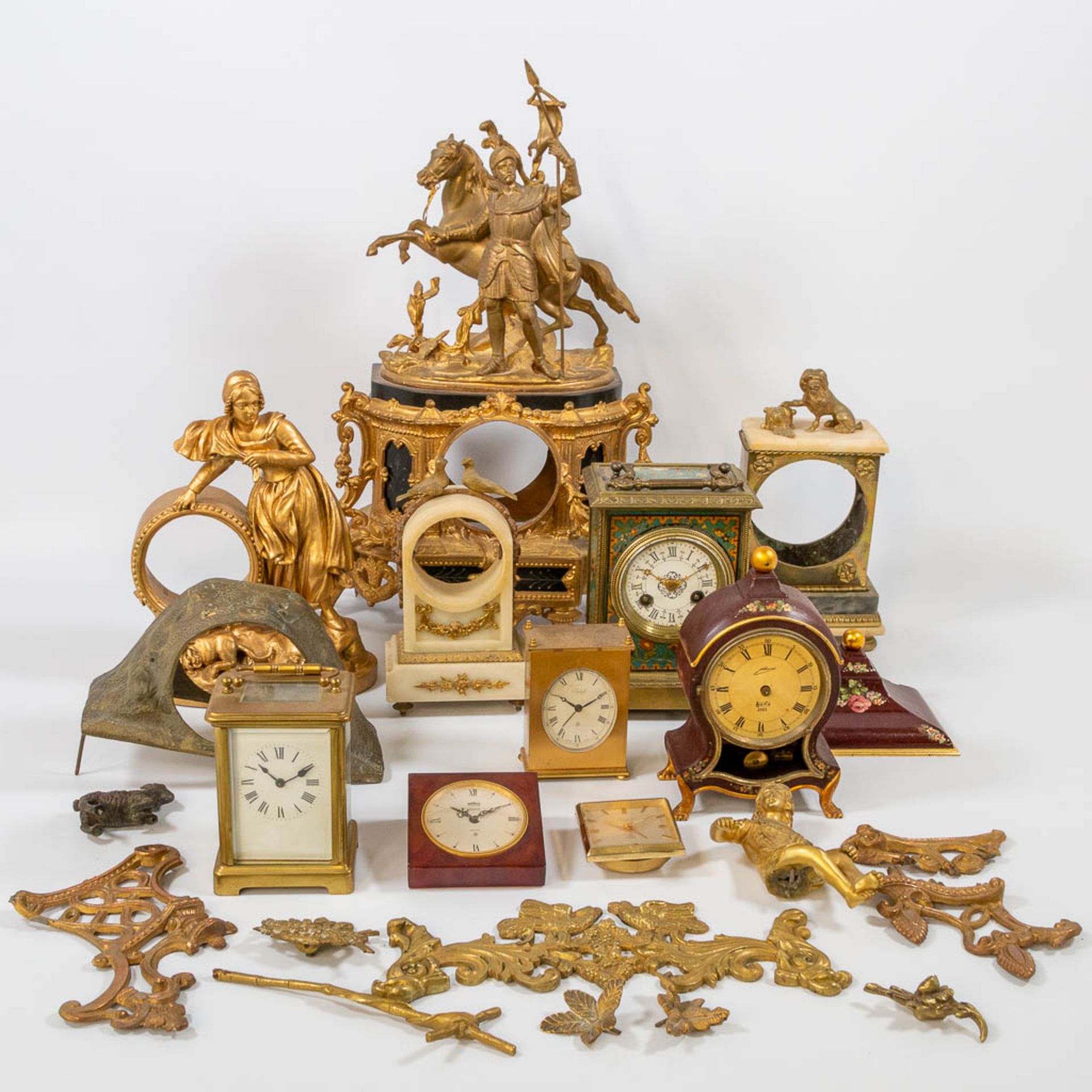 A collection of clocks and parts, a comptoise, an officers clock and table clock marked 'Jaeger Le C - Bild 10 aus 22