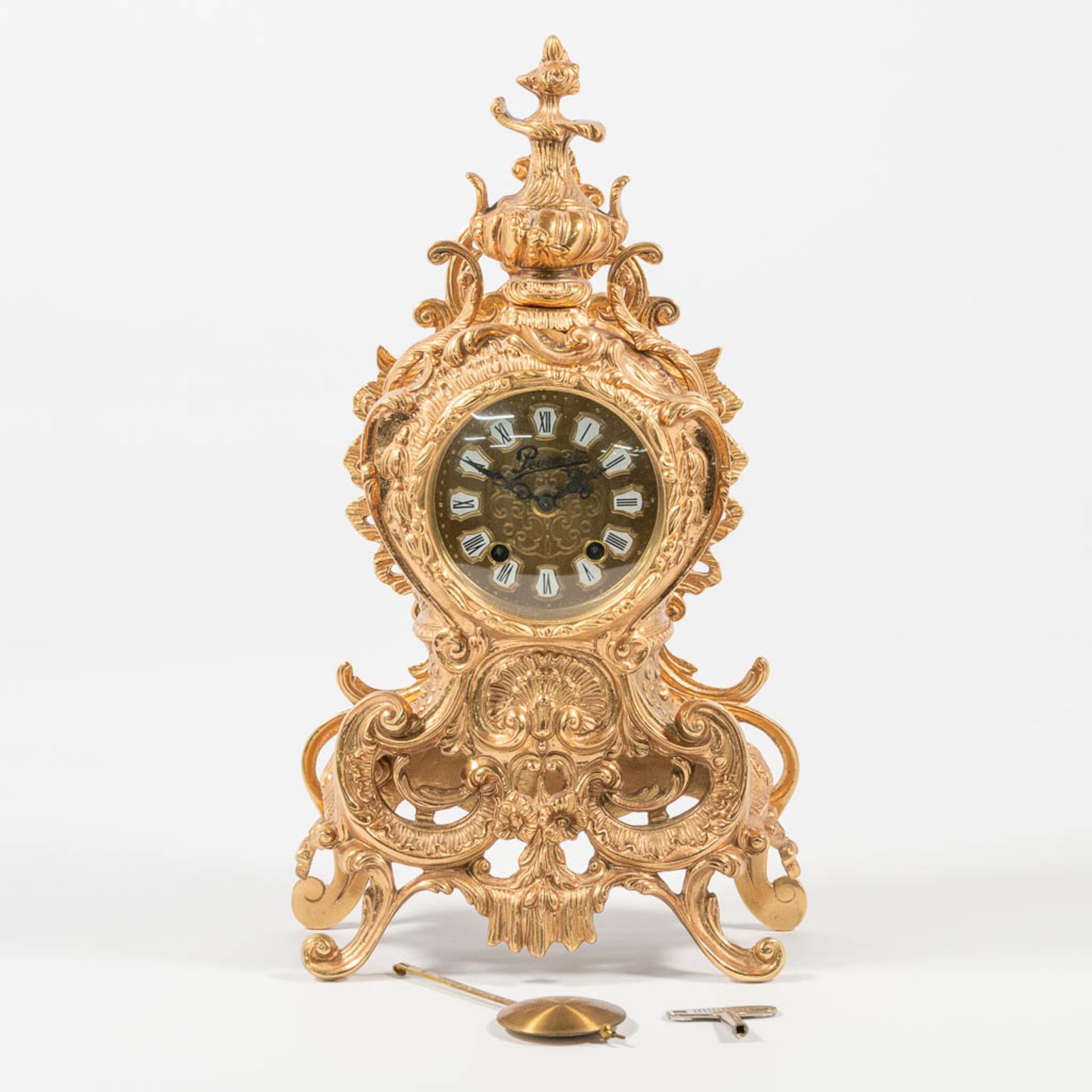 A vintage bronze clock 'Pevanda' with mechanical movement, made around 1970.