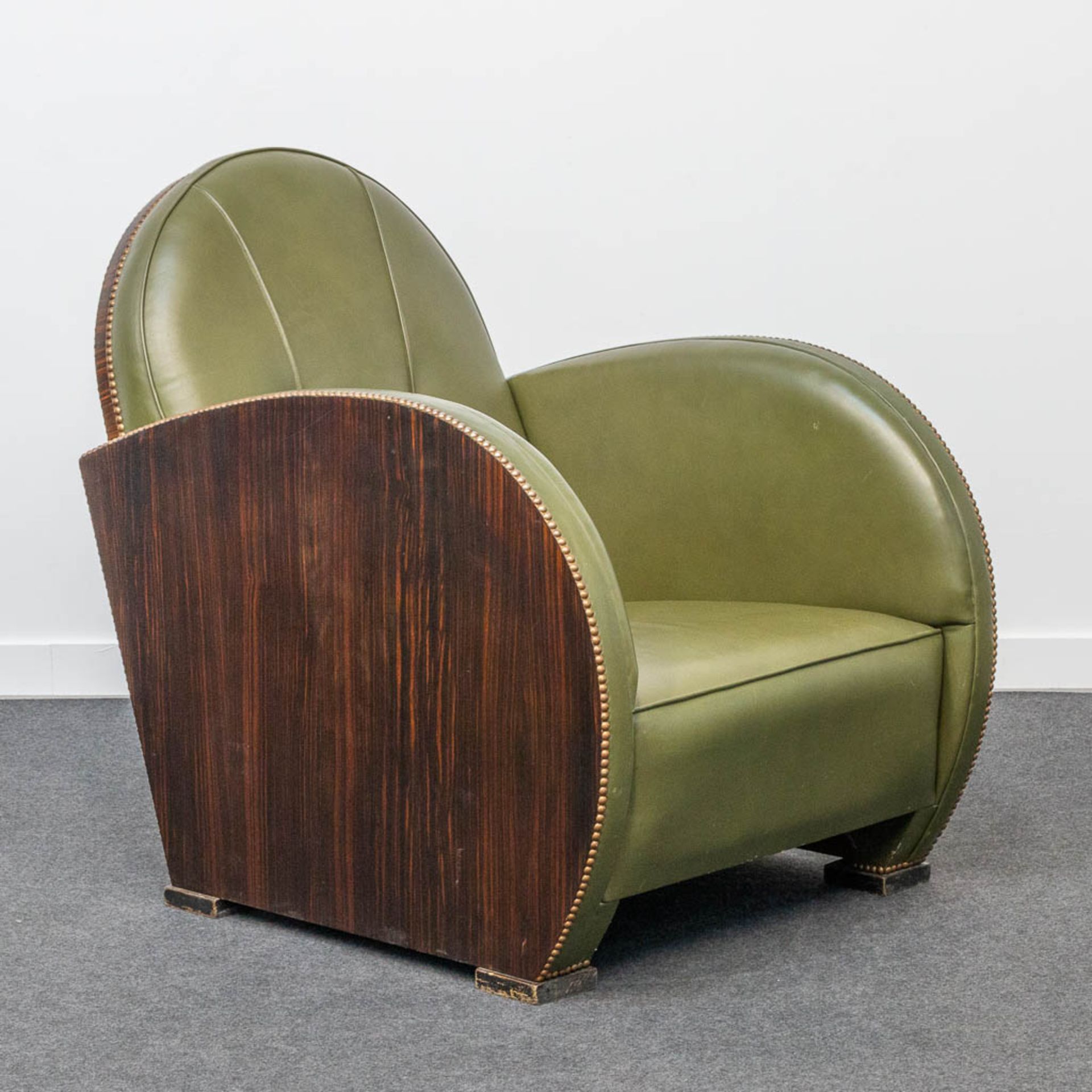 An armchair, upholstered with leather and with wood sides, art deco style. - Image 6 of 20