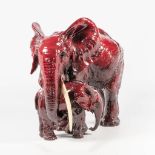 Guido CACCIAPUOTI (1892-1953) An elephant with calf made of red glazed ceramics