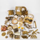 A large collection of parts and pieces of clocks, with a few complete movements.