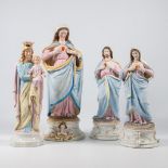 A collection of 4 bisque porcelain holy statues, Mary, Joseph, and Madonna.