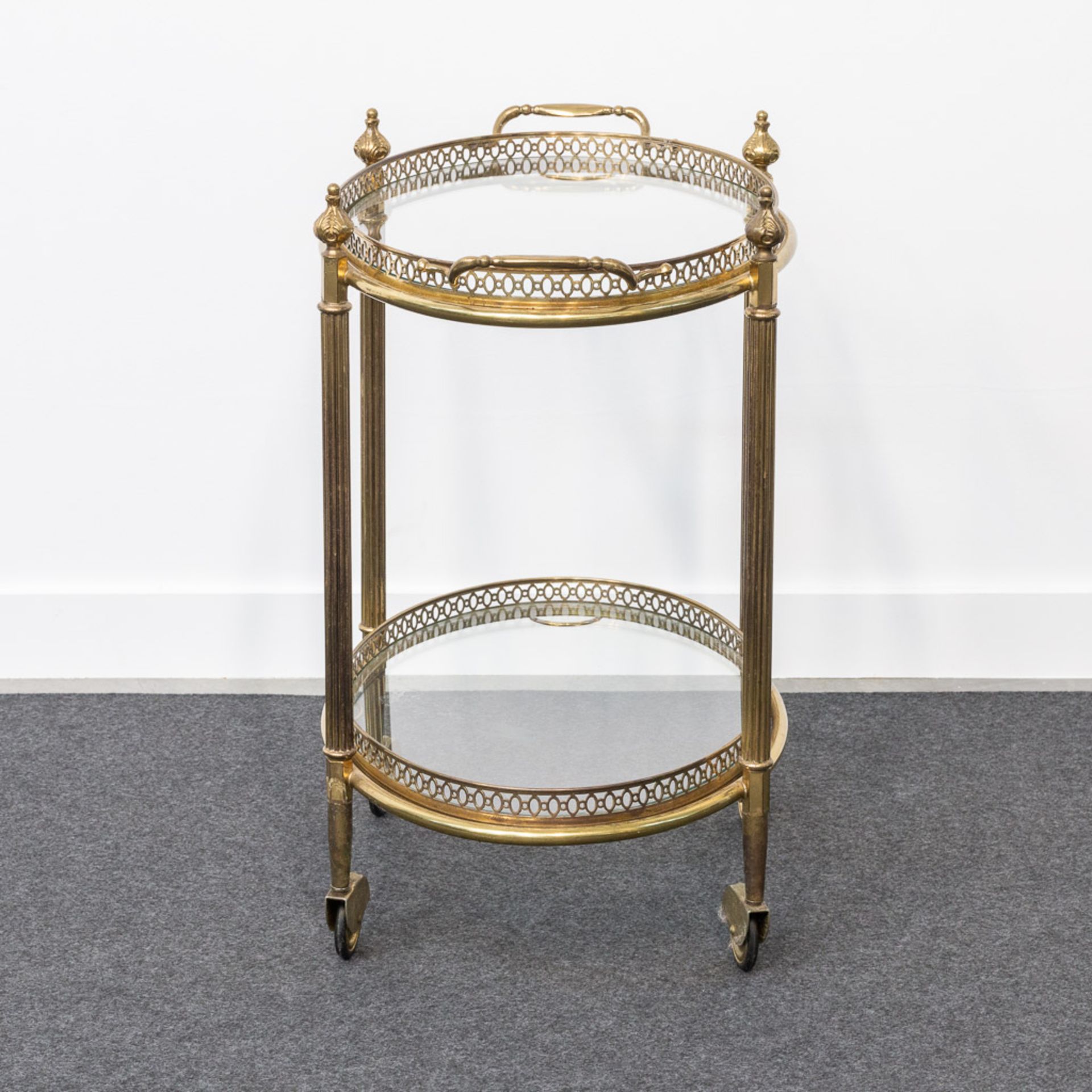 A metal and glass side table on wheels, in the style of Maison Jansen. - Image 11 of 20