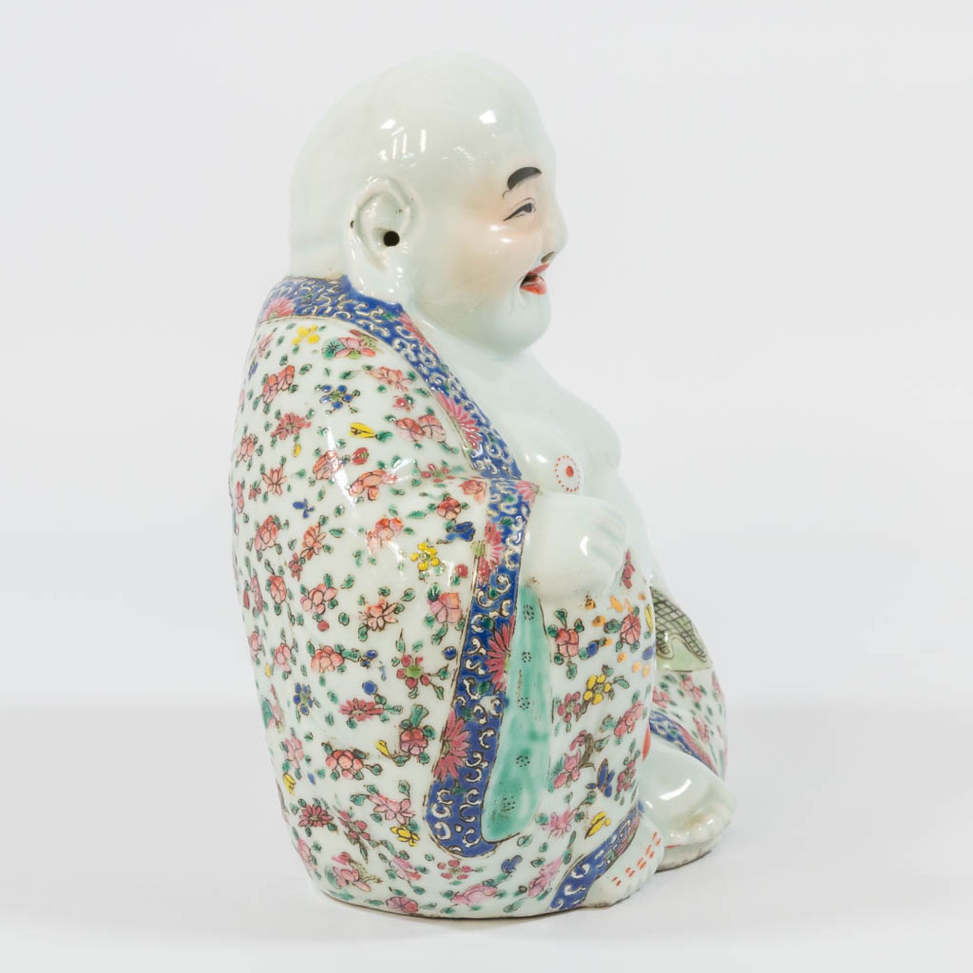 A Chinese laughing buddha, made of porcelain. - Image 6 of 27