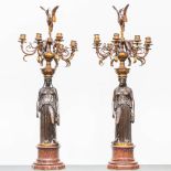 An Exceptionally large pair of bronze candelabra, in Empire style on a red marble base. Probably Bar