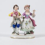 A group of dancing children, made of porcelain.