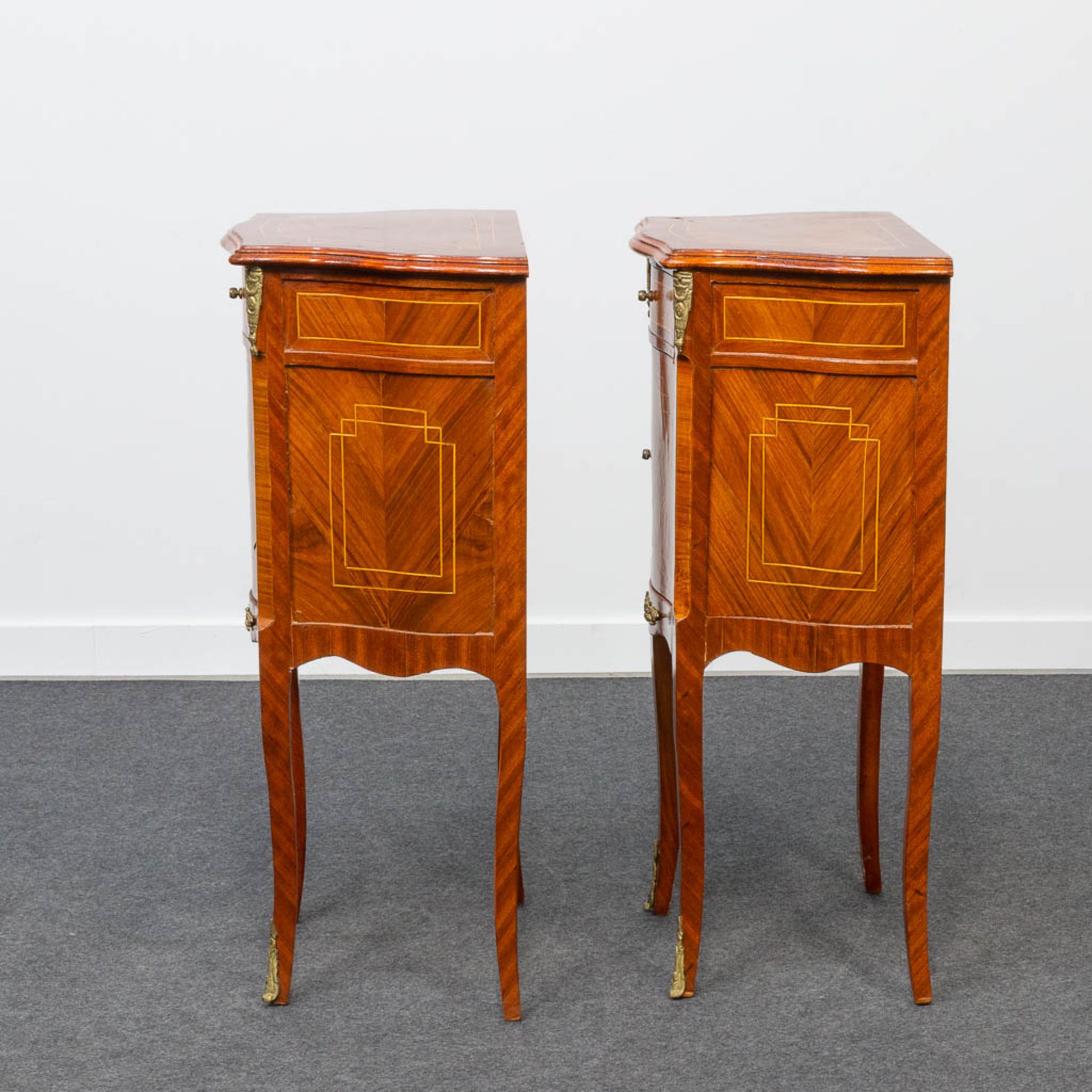 A pair of bronze mounted nightstands, inlaid with marquetry. Second half of the 20th century. - Image 12 of 22