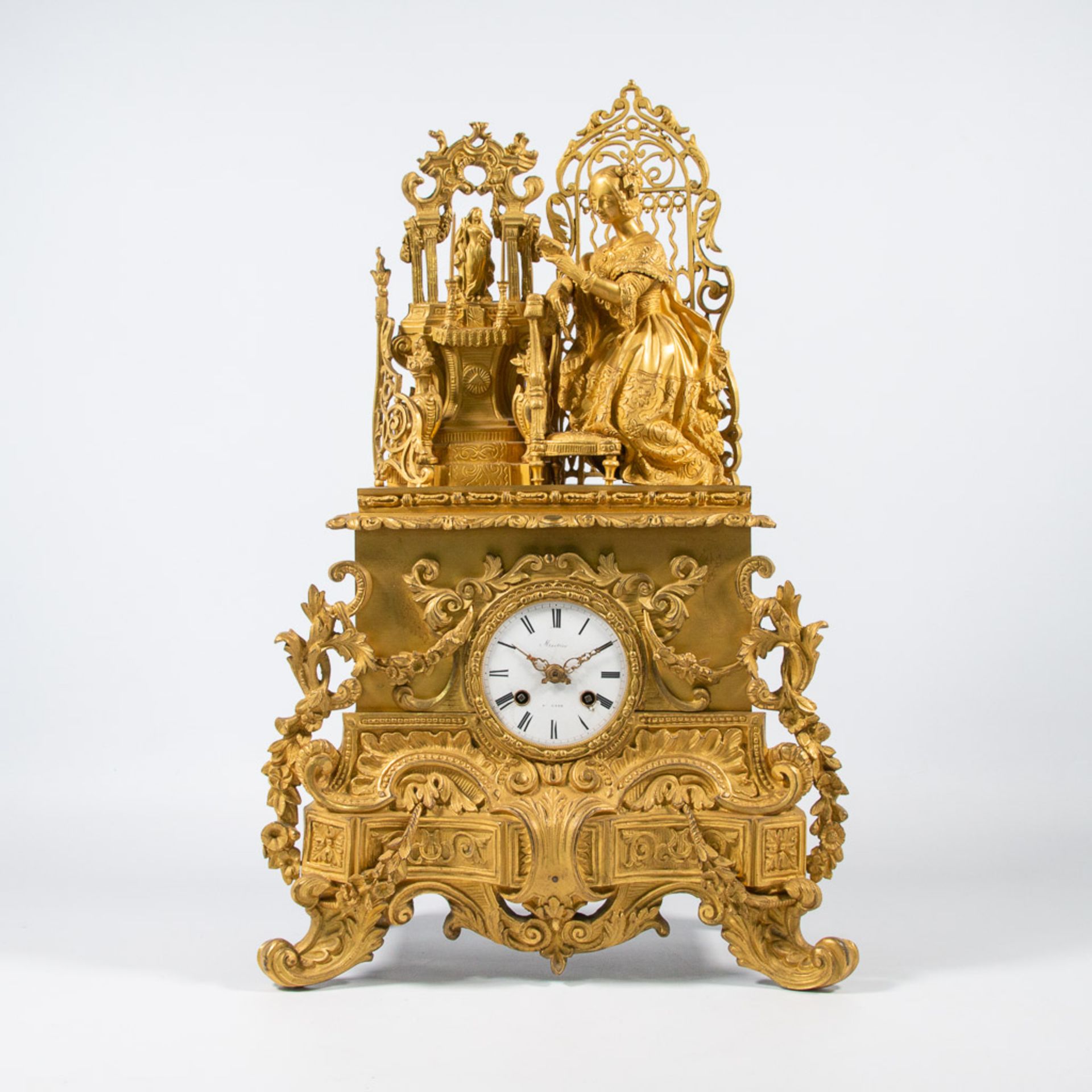 An ormolu bronze clock, 'Mortier à Gand', 19th century.