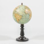 G. Thomas, Paris, A small globe on a wood base.