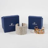 A Collection of 2 bracelets with Swarovski crystals, in new condition with their original boxes.