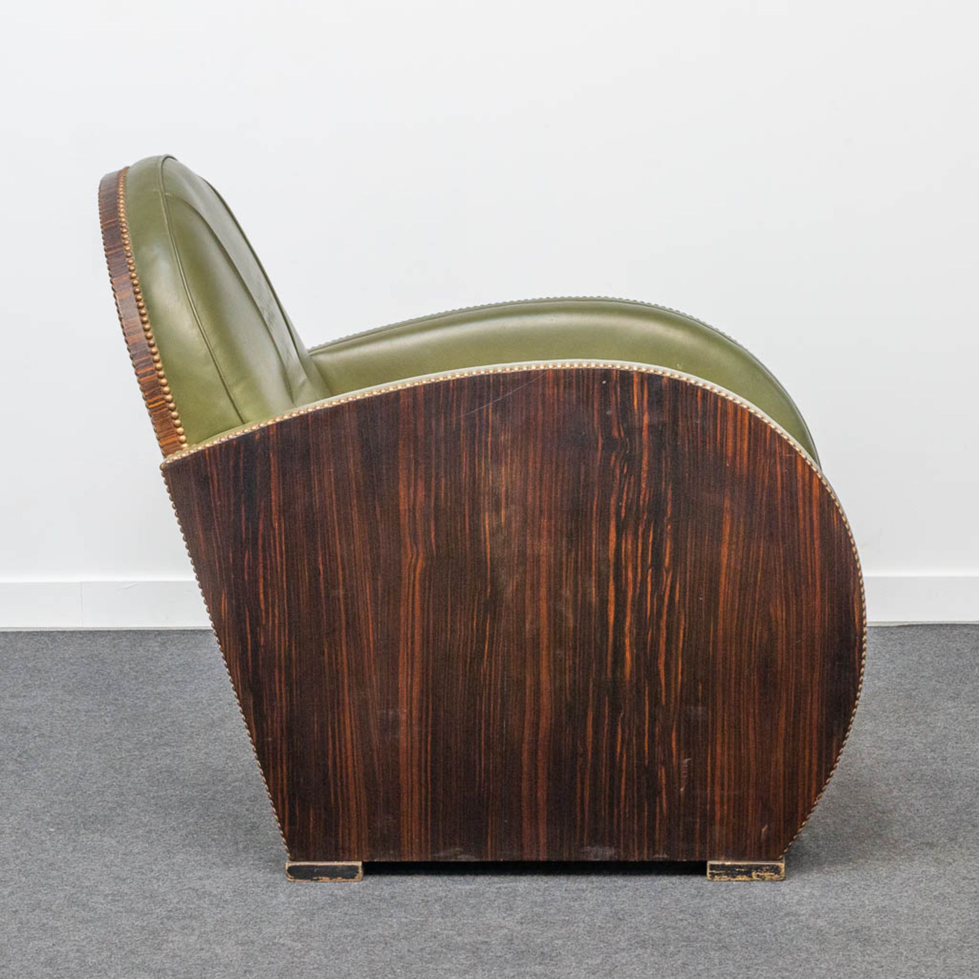 An armchair, upholstered with leather and with wood sides, art deco style. - Image 10 of 20