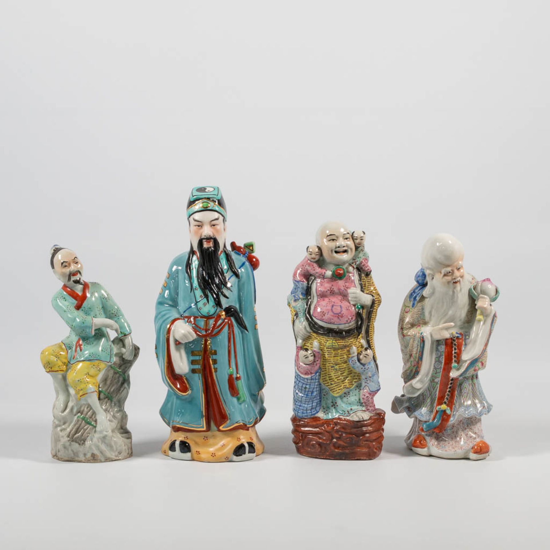A Collection of 4 Chinese immortal figurines, made of porcelain.