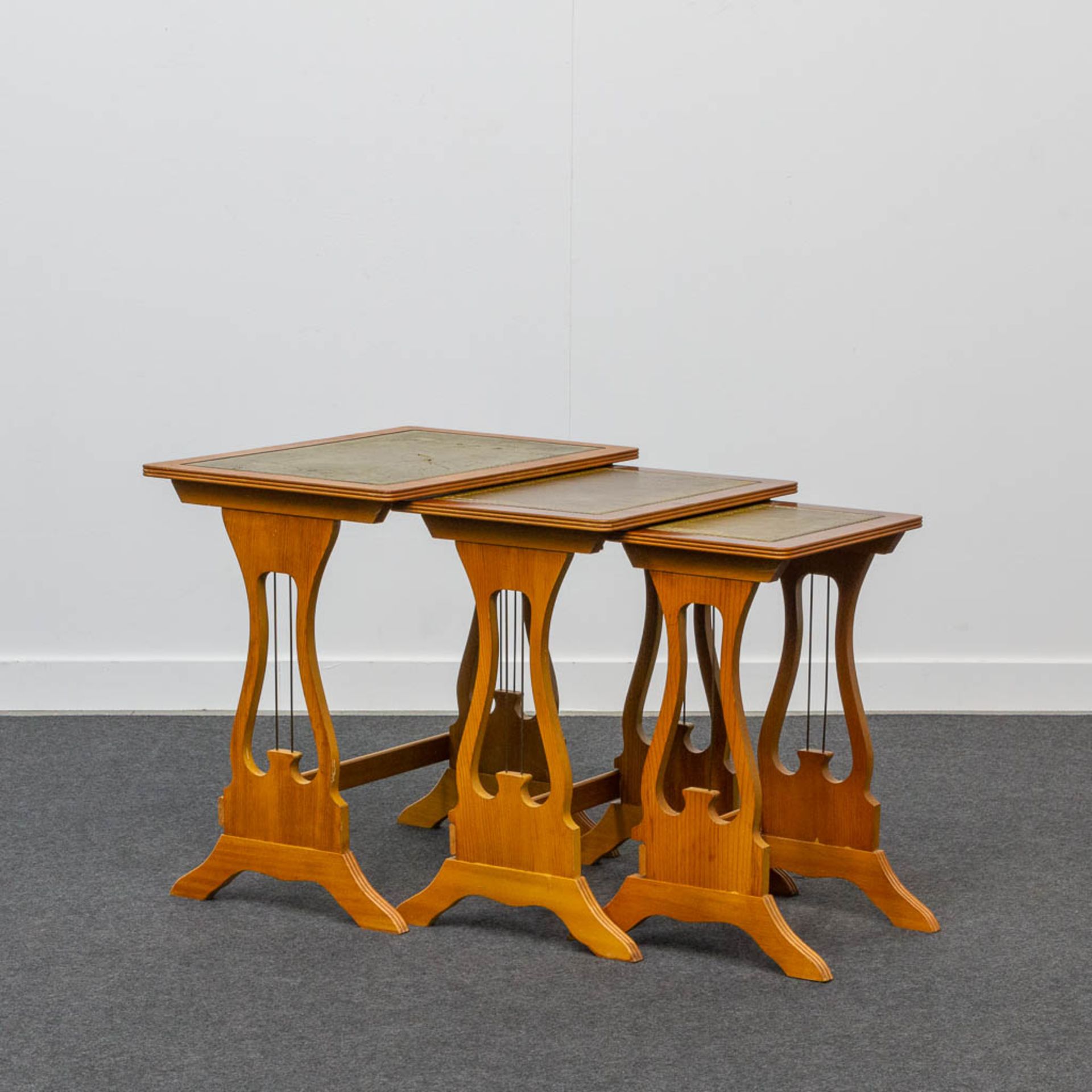 A collection of 3 cigogne tables with leather top. - Bild 4 aus 20