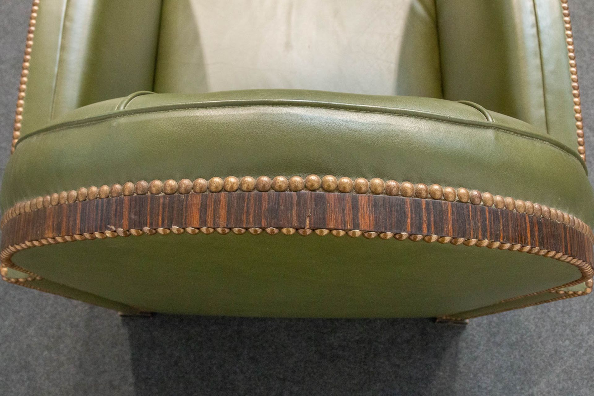 An armchair, upholstered with leather and with wood sides, art deco style. - Image 18 of 20