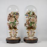 A Pair of glass domes with Vieux Bruxelles vase and flowers