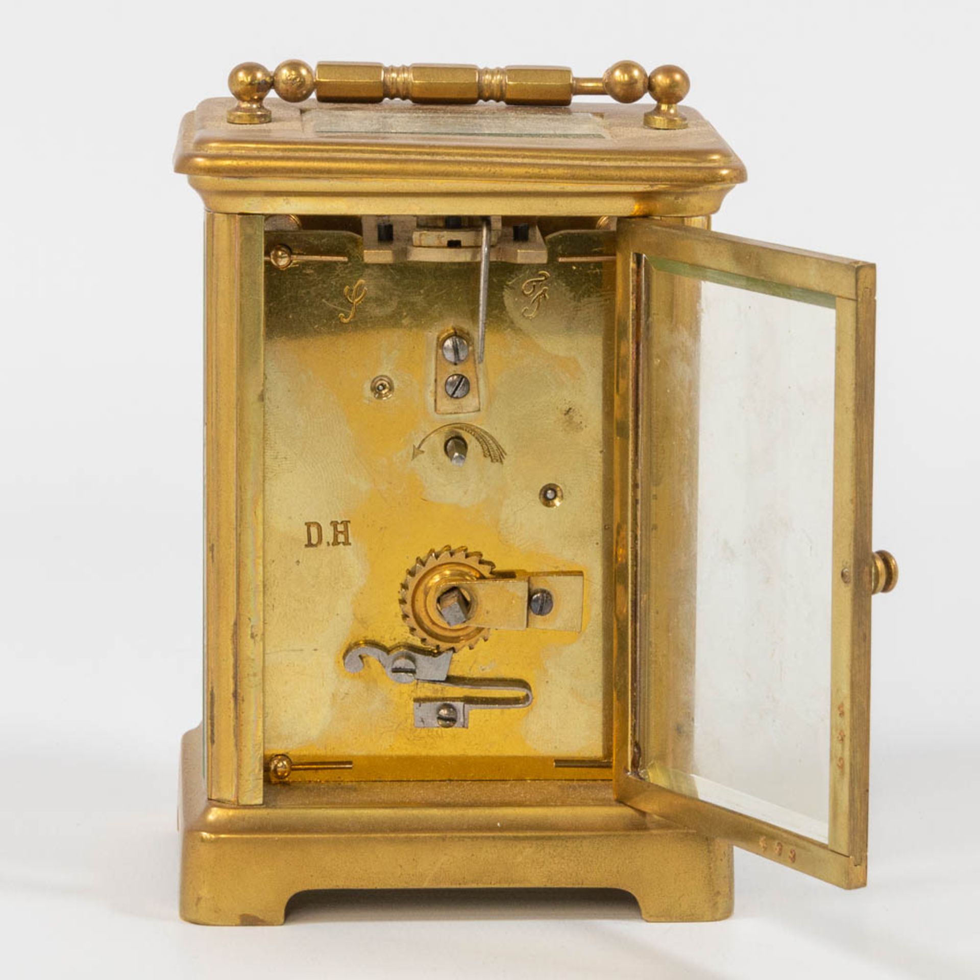 A collection of clocks and parts, a comptoise, an officers clock and table clock marked 'Jaeger Le C - Bild 4 aus 22