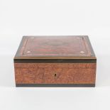 An Antique storage box, with inlaid ebony, root wood and cherry wood with brass. Marked Auguste 1877