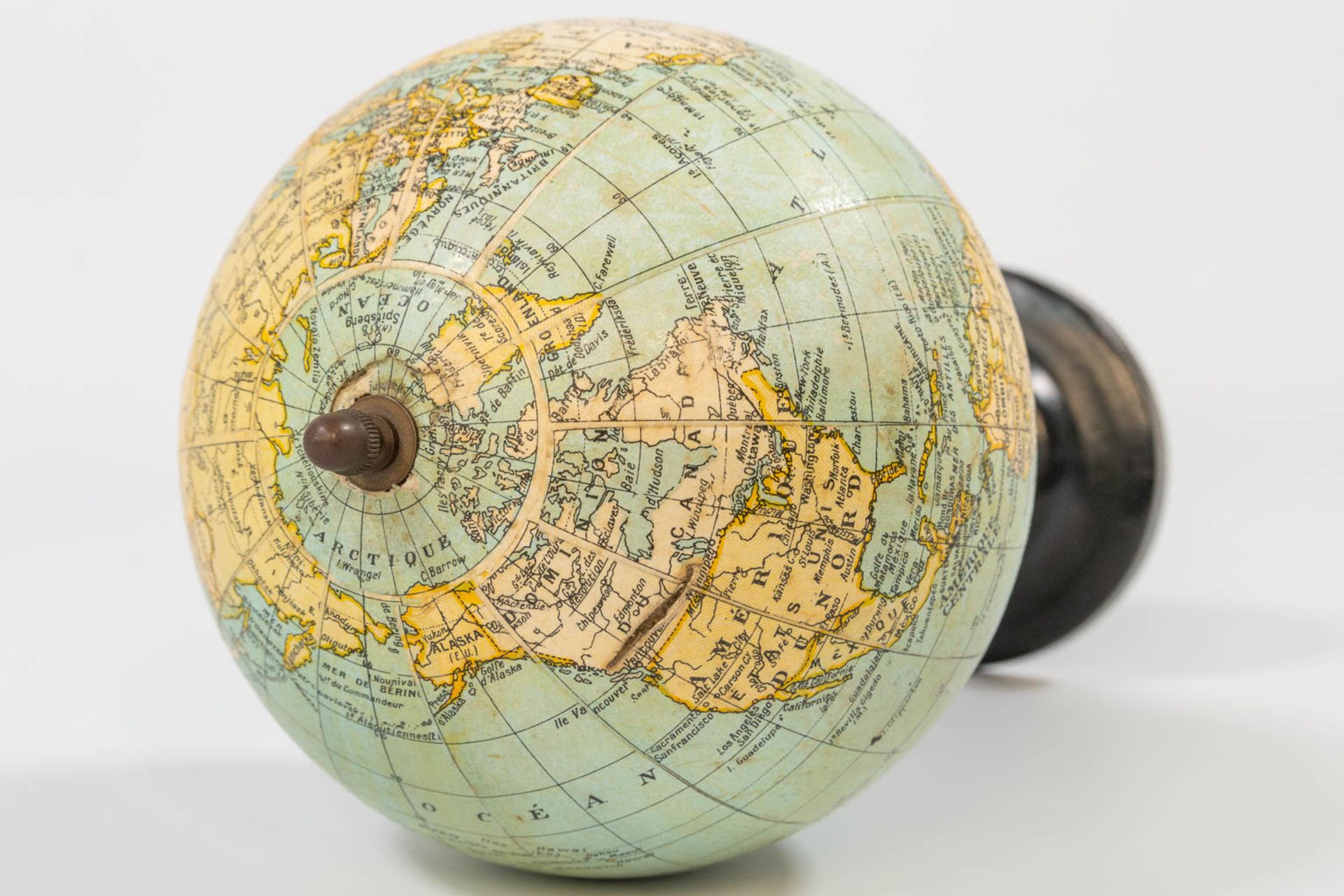 G. Thomas, Paris, A small globe on a wood base. - Image 9 of 9
