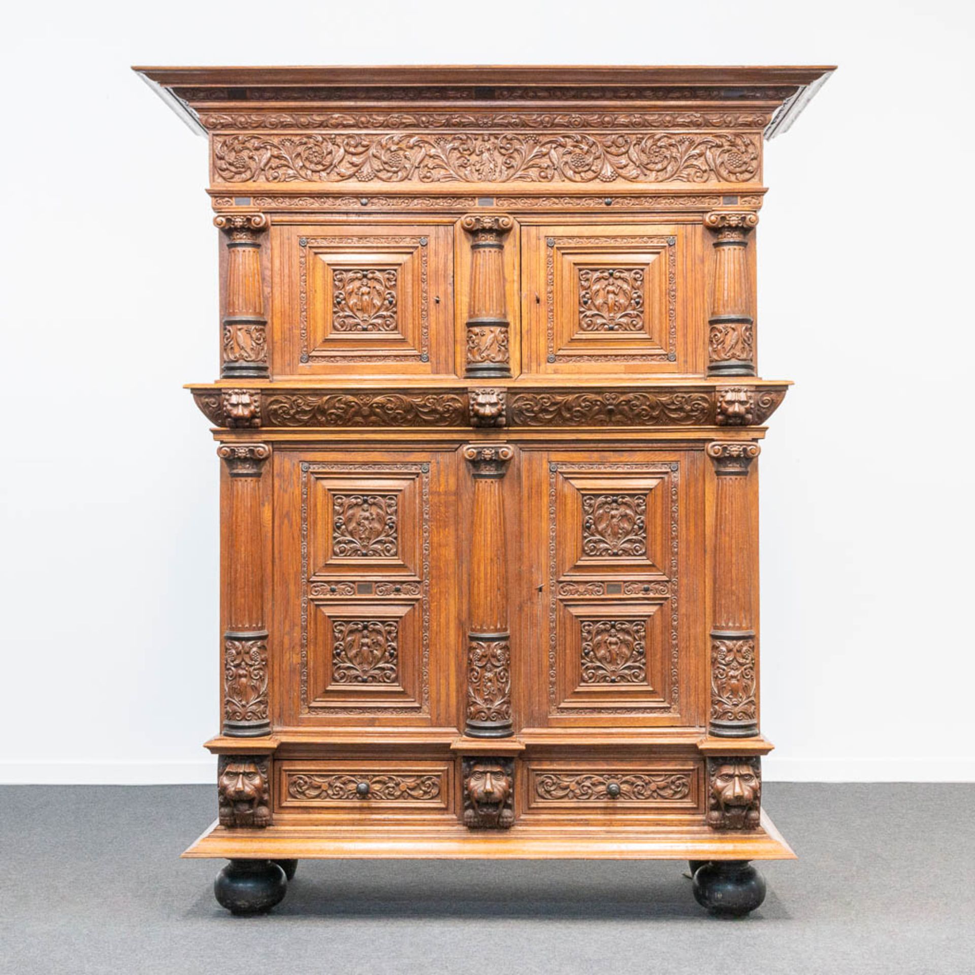 A cabinet, made in Flemish renaissance style, oak with fine sculptures, 19th century.
