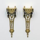 A pair of Napoleon 3 Wall mounted consoles, made of bronze.