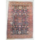A large Bakhtiari hand-made oriental carpet. 555 x 343