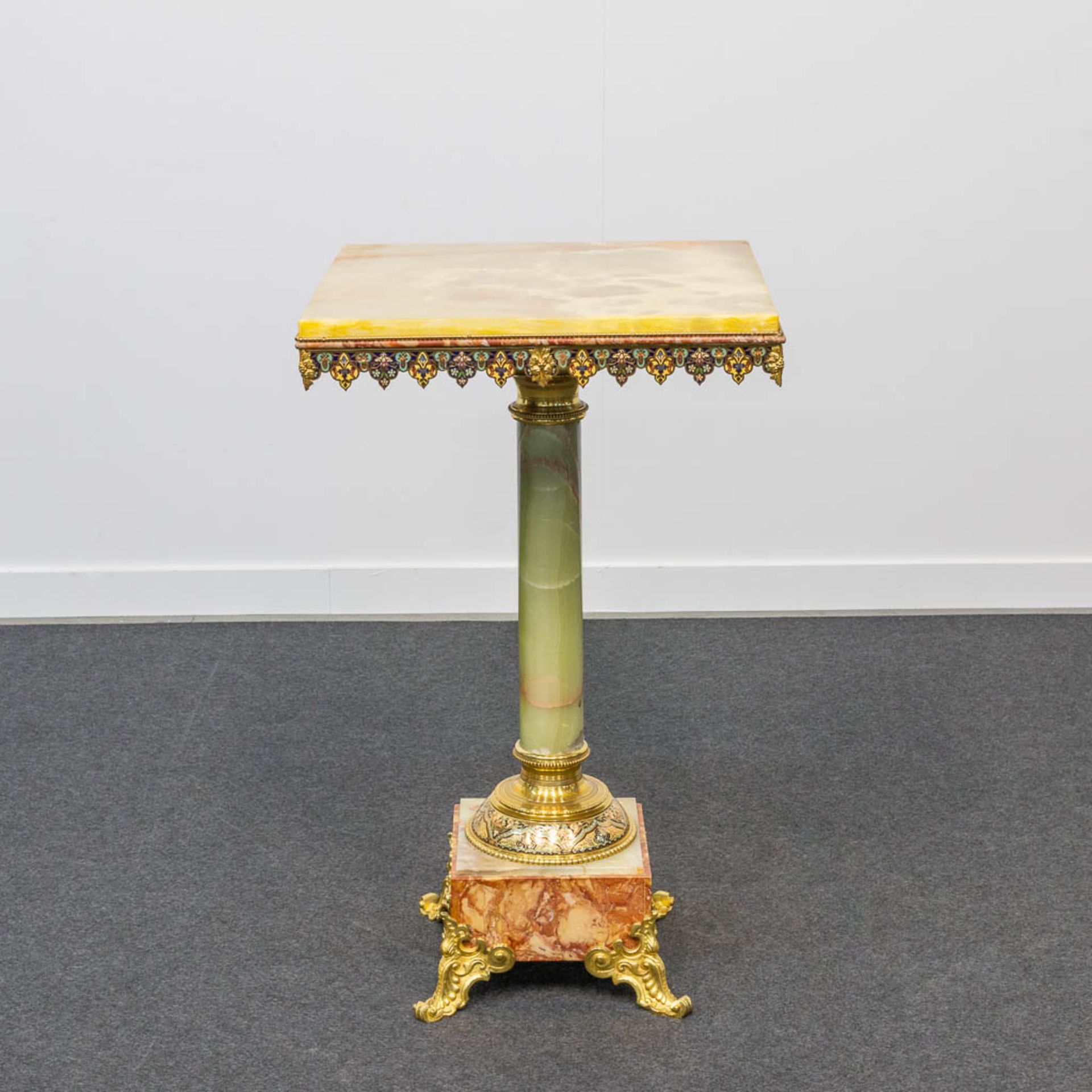 An exceptional side table made of onyx and marble, decorated with bronze and inlaid cloisonné