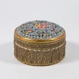 An Elfinware Jewelry box with porcelain flowers and bronze sides.