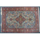 An Oriental, hand-made carpet. 205 x 145