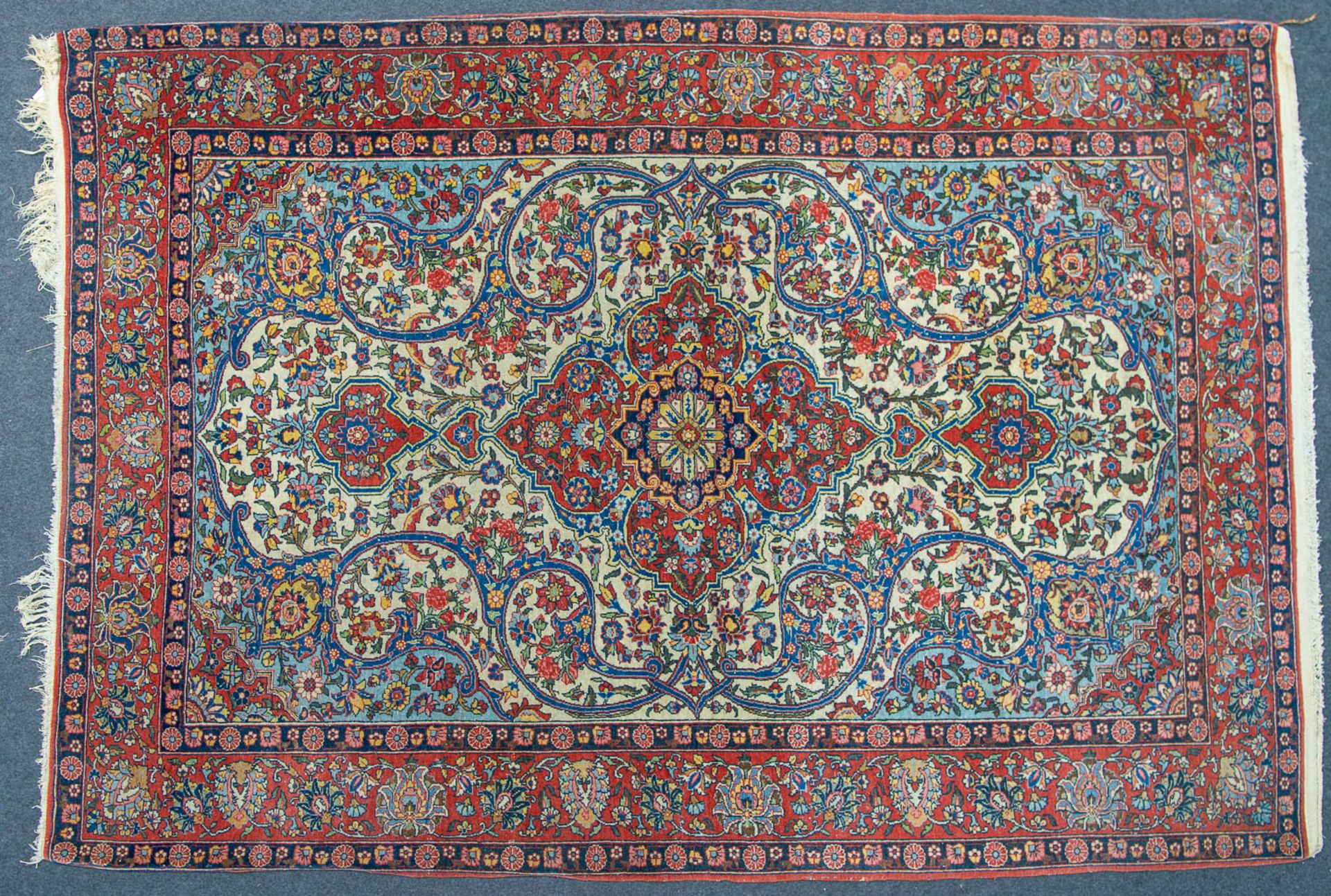 An Oriental, hand-made carpet. 205 x 145