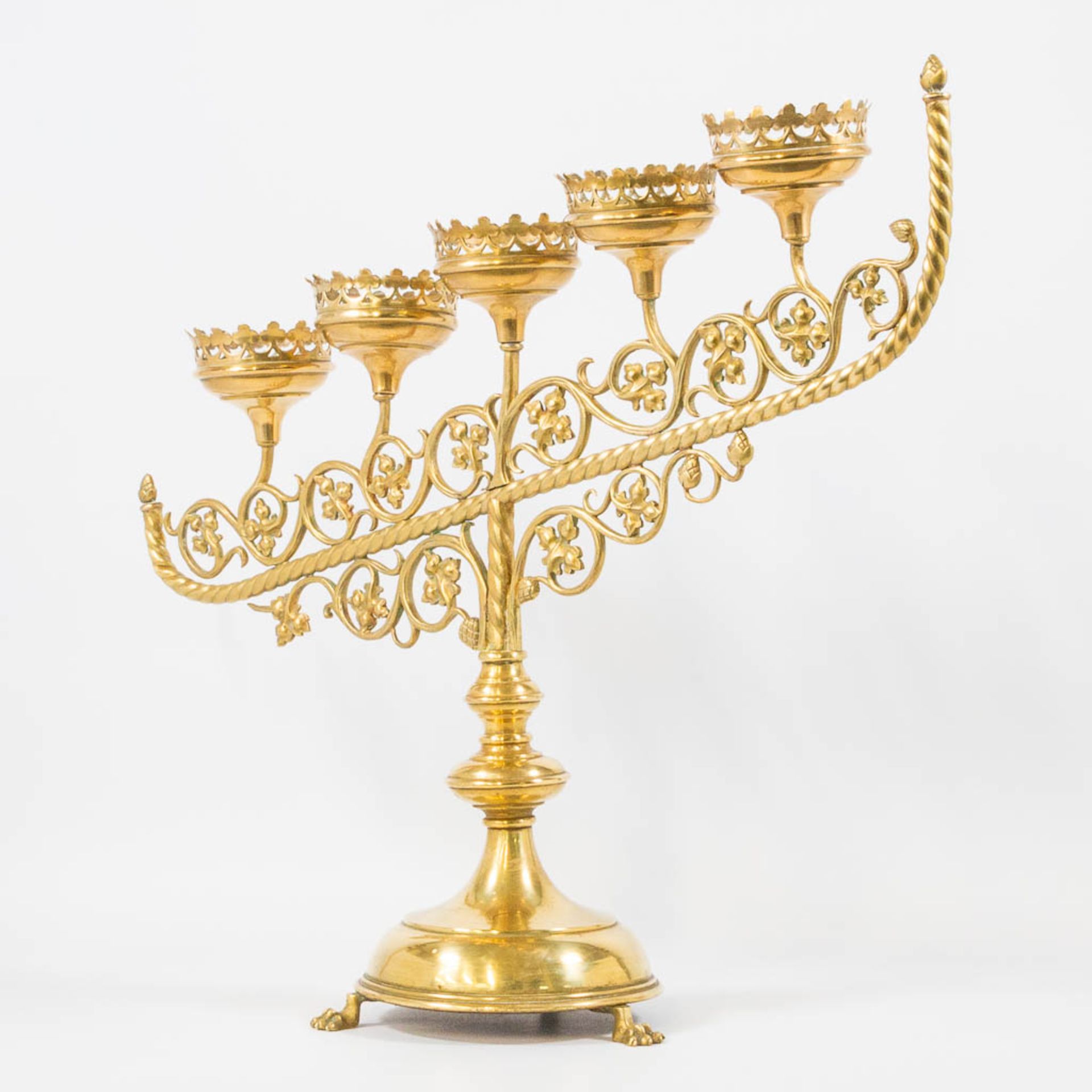 An Antique brass church candelabra, decorated with grape vine leaves and standing on claw feet, Fran - Image 14 of 22