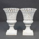 A pair of cast-iron garden vases, with basket style pattern. Second half of 20th century.