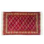An Oriental, hand-made carpet, Yamoud. 331 x 213