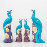 A collection of 2 pairs of peacocks in Chinese ceramics, decorated with peonies.