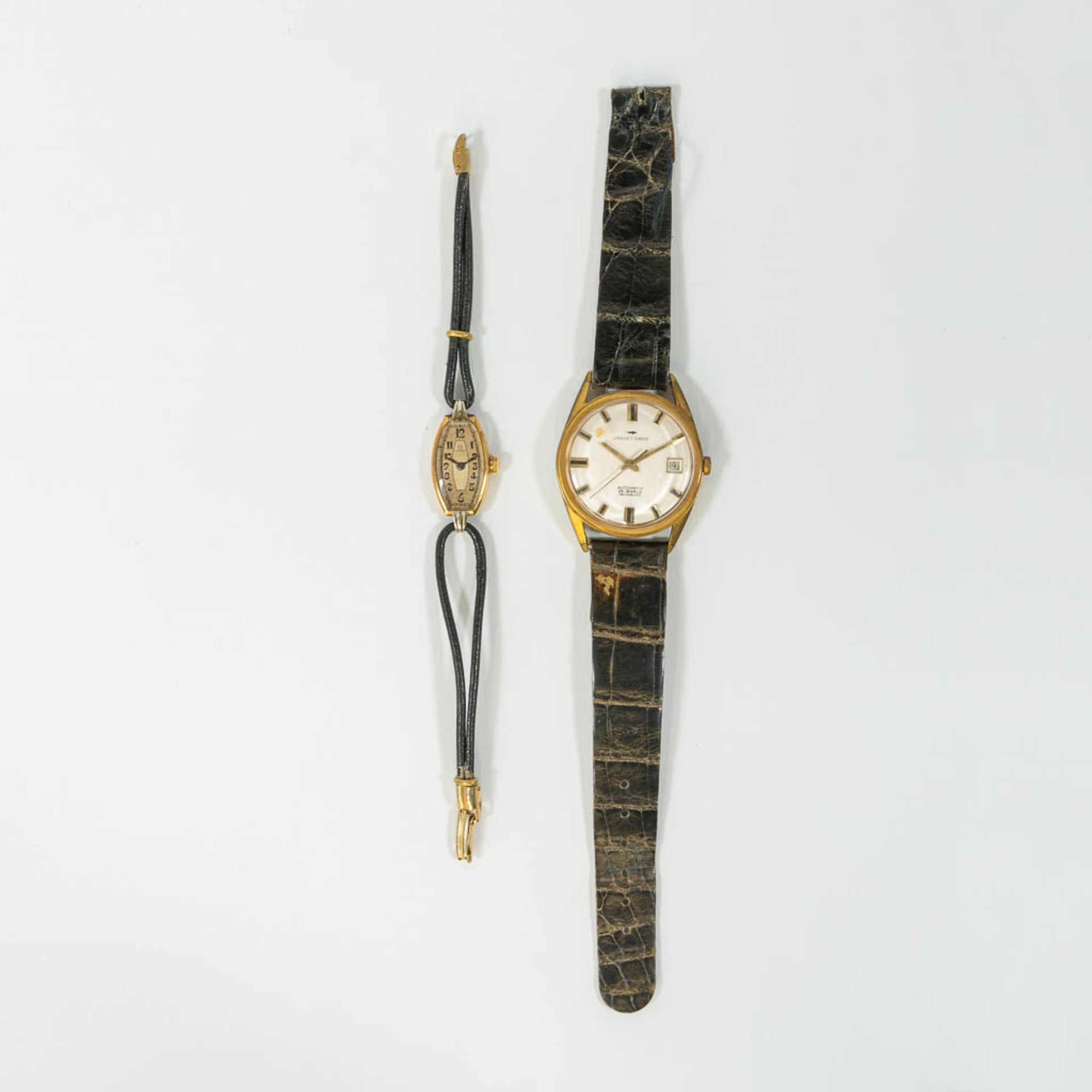 A collection of 2 wristwatches: Omega antique woman's 18kt gold and Jaqcuet Droz vintage watch.
