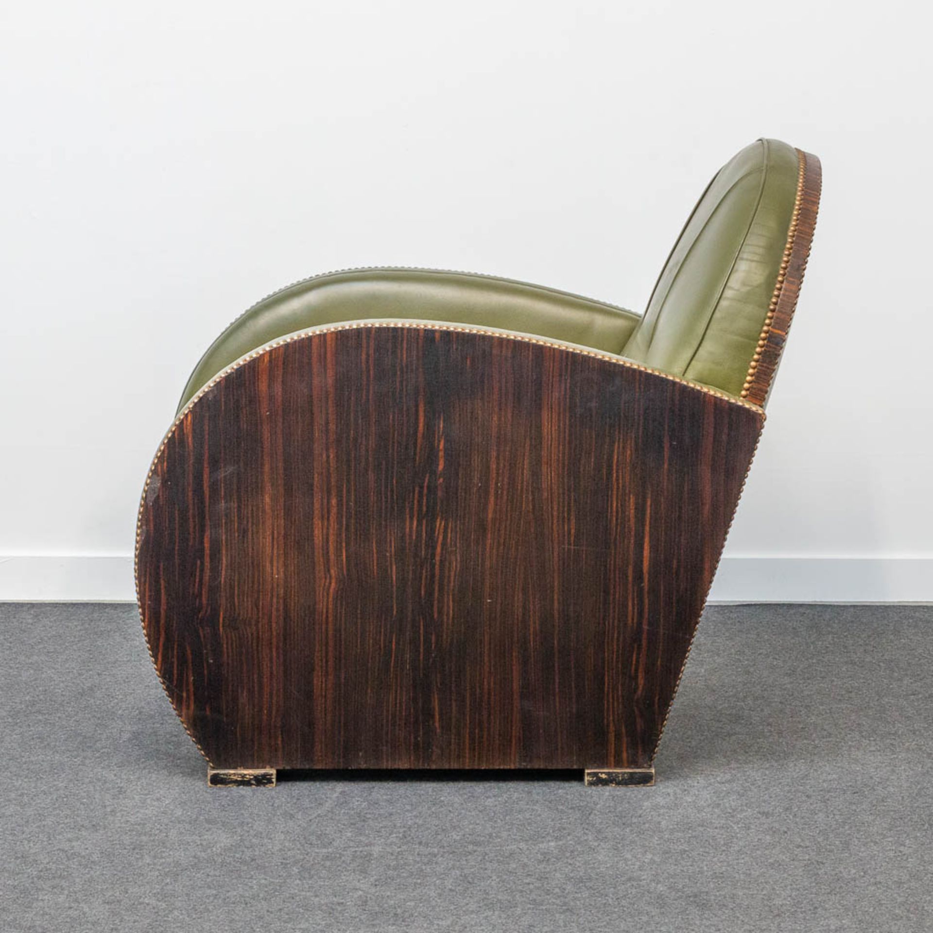 An armchair, upholstered with leather and with wood sides, art deco style. - Image 8 of 20