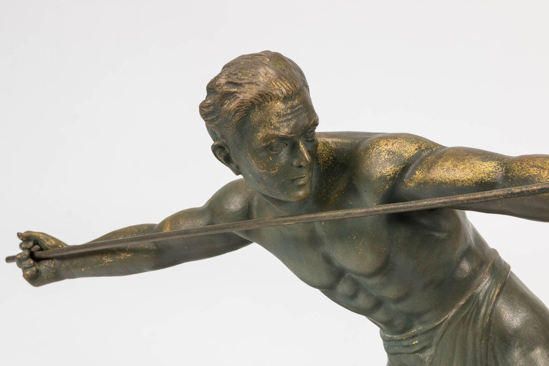 A bronze statue of a spear thrower in art deco style and standing on a marble base. The first half o - Bild 11 aus 13