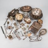 A large collection of silver and silver-plated items.