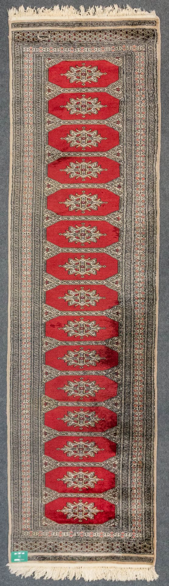 An Oriental hand-made runner carpet Bokhara (285 x 79 cm). - Image 3 of 7