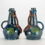 A pair of vases made in Flemish Earthenware with the decor of a salamander. (27 x 30 x 45 cm)