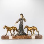 An art deco group of a lady walking her two greyhounds, spelter and marble. (16 x 77,5 x 50 cm)