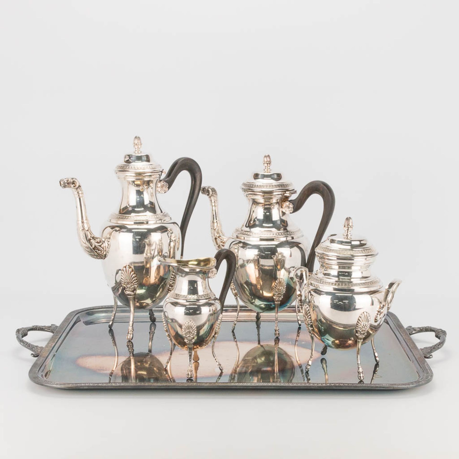 A silver-plated coffee and tea service, on a serving tray. With ebony handles. In the style of a Mal