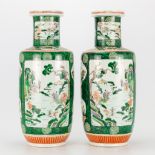 a pair of Chinese famille verte display vases with landscape decor, images of the 'Eight Precious Th