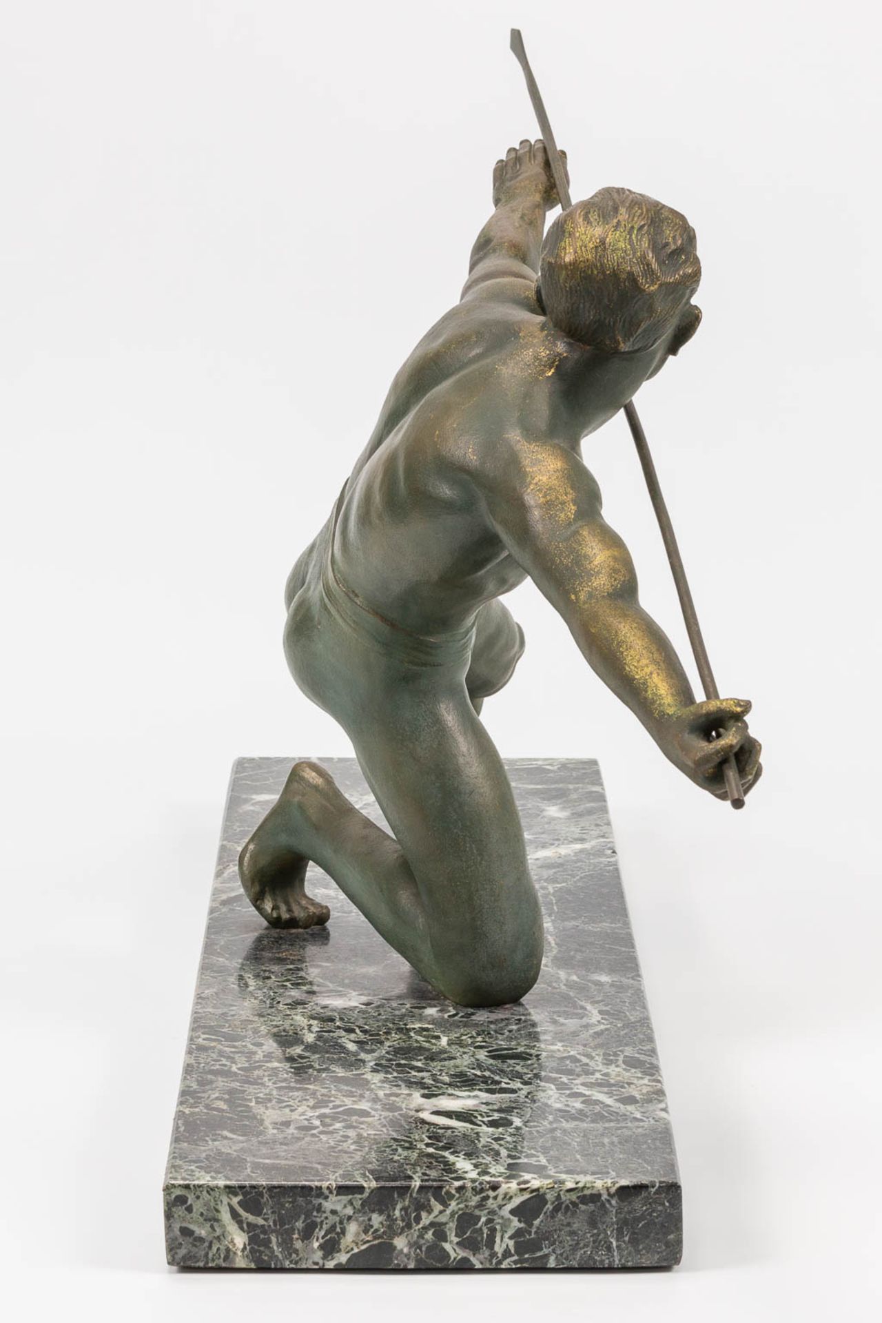 A bronze statue of a spear thrower in art deco style and standing on a marble base. The first half o - Bild 8 aus 13