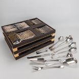 A silver flatware set made by Christoflde, model Perles and consisting of 154 pieces in drawers.