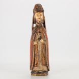 An antique wood sculptured statue of a holy figurine with original polychrom. 18th/19th century. (6